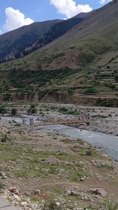 1.82 km Farm to Market Road, including a suspension bridge at Dari Faqirkot, Astore,…