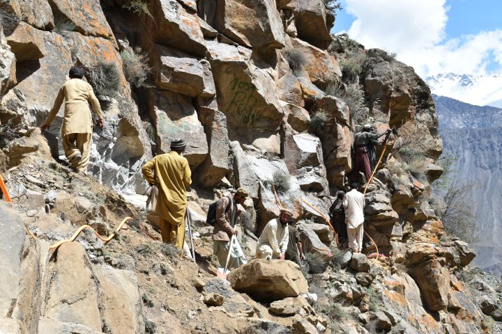 Labourers at the toughest section of Gulapur irrigation channel, Punyal, Ghizer